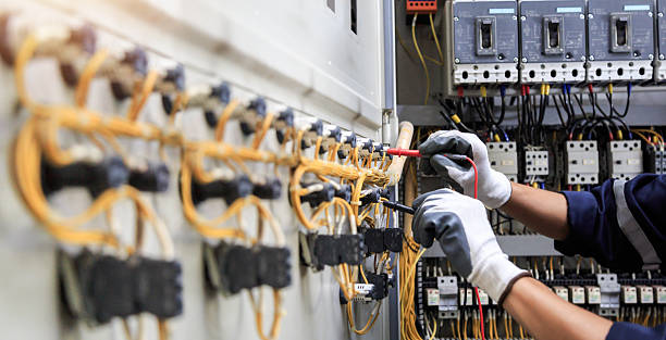 Professional Electrician technician working in Siloam Springs, AR